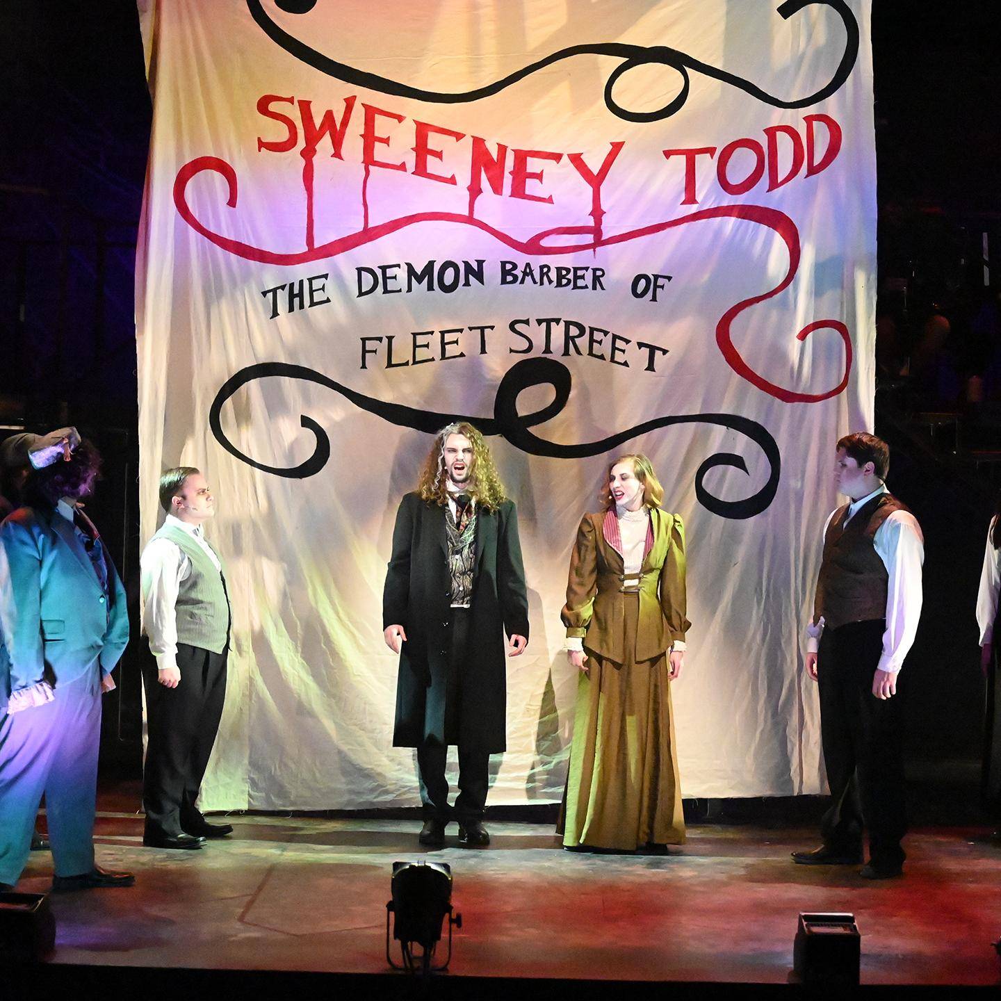 a group of people on a stage
