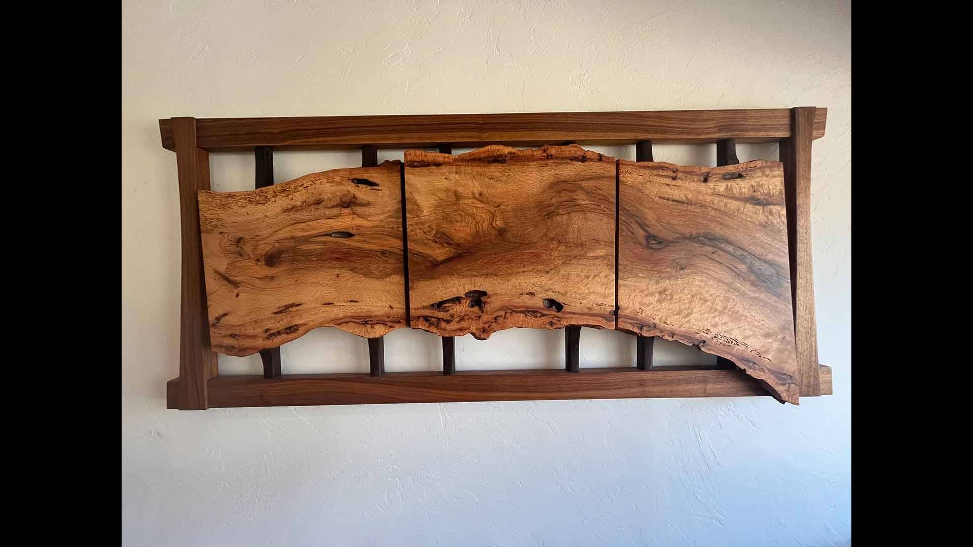 a wood piece of wood on a wall