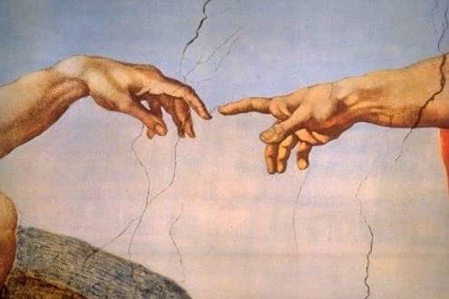 a close-up of hands touching each other