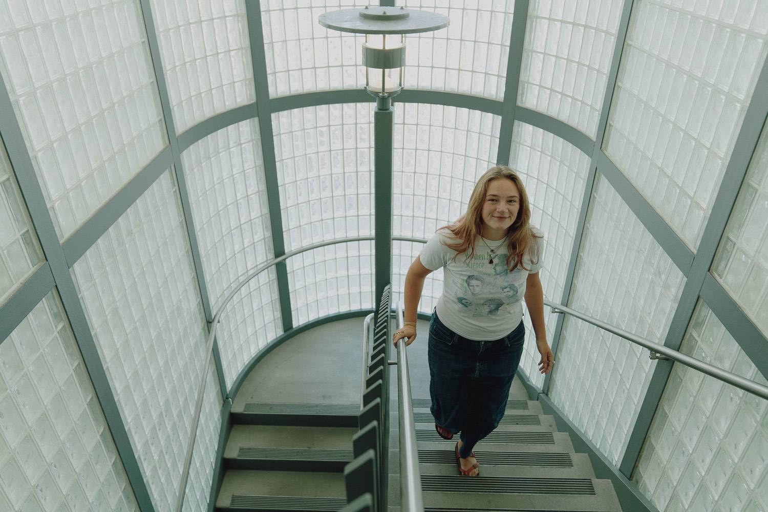 a person walking up a staircase