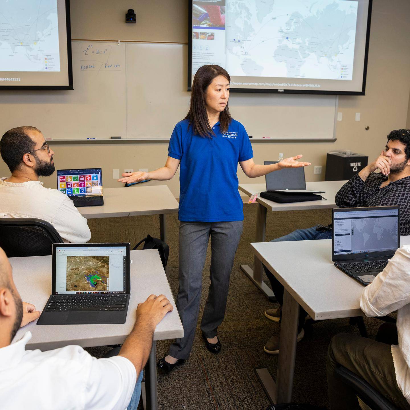 a person standing in front of a group of people