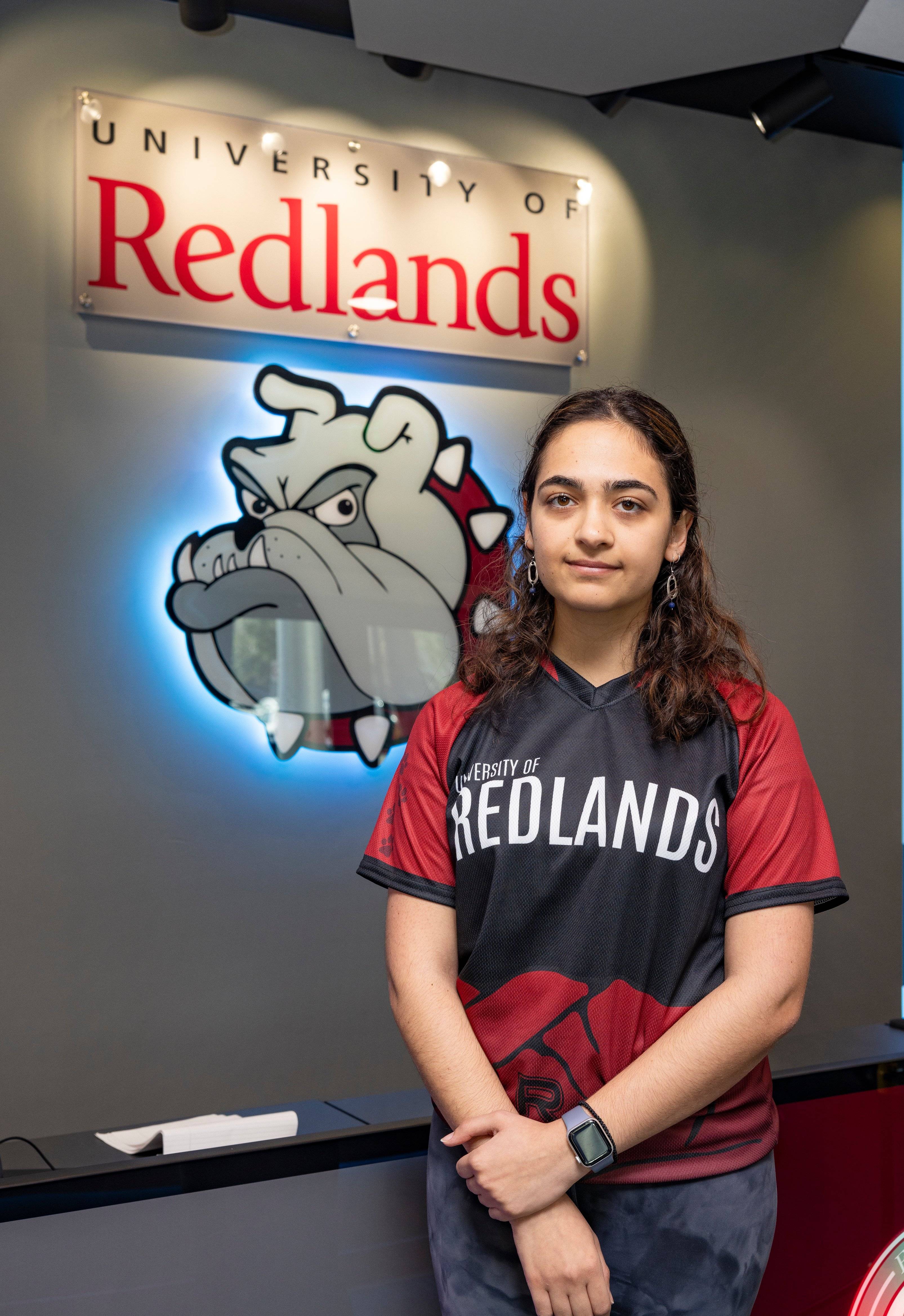 a person standing in front of a sign