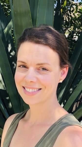 a person smiling at the camera