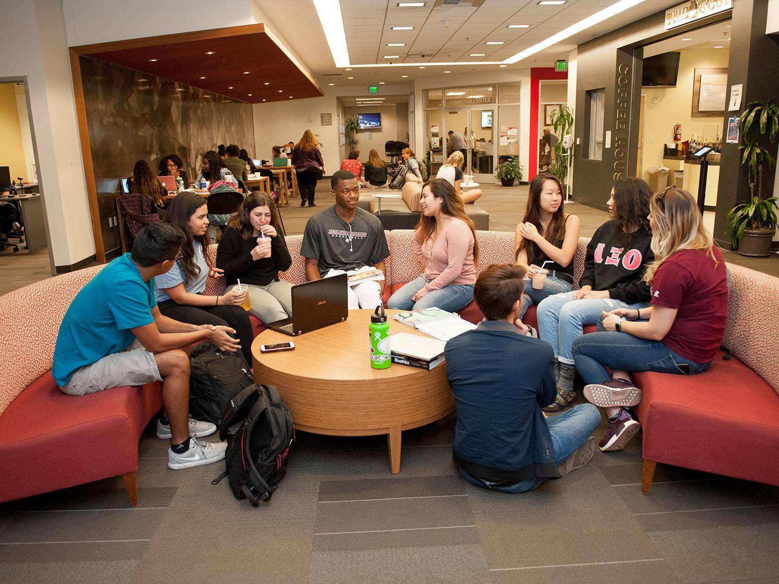 a group of people sitting on a couch