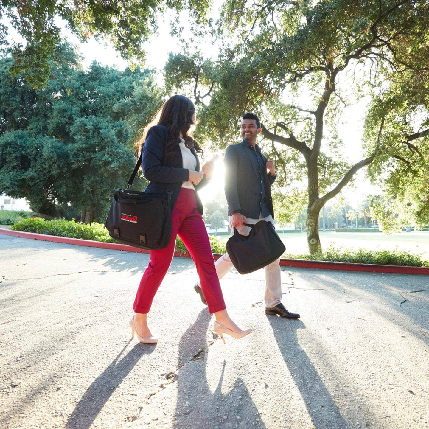 a person and person walking on a street