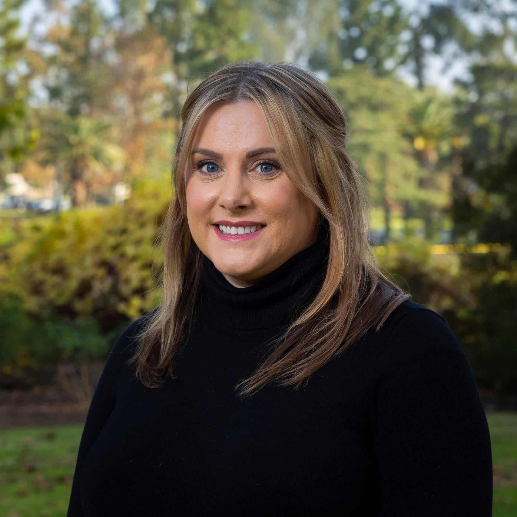 a person smiling at camera