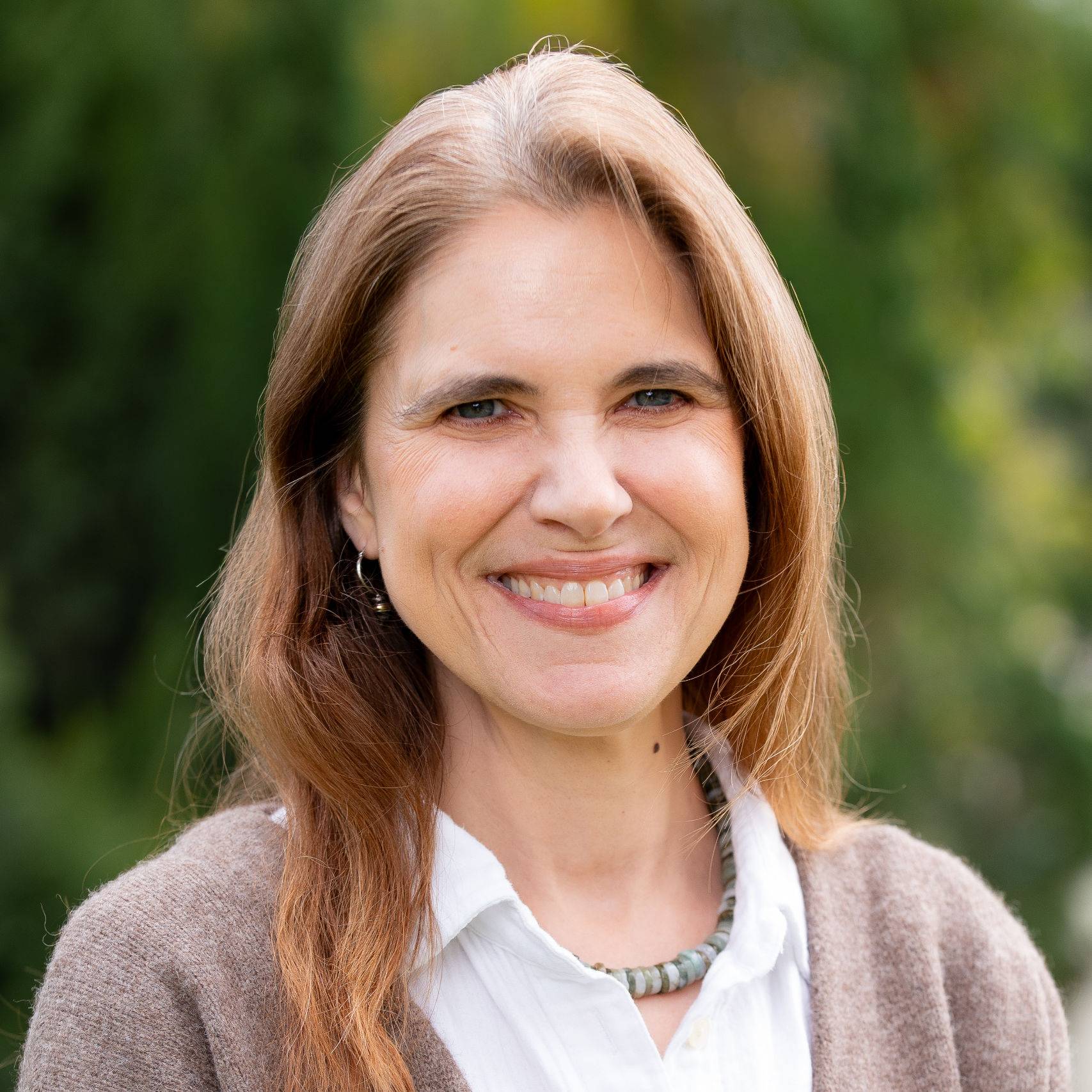 a person smiling at camera