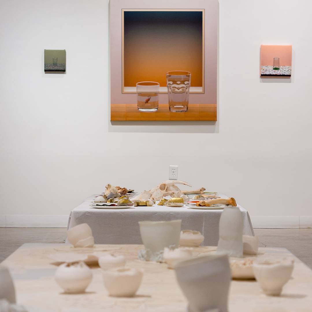 a table with broken dishes on it