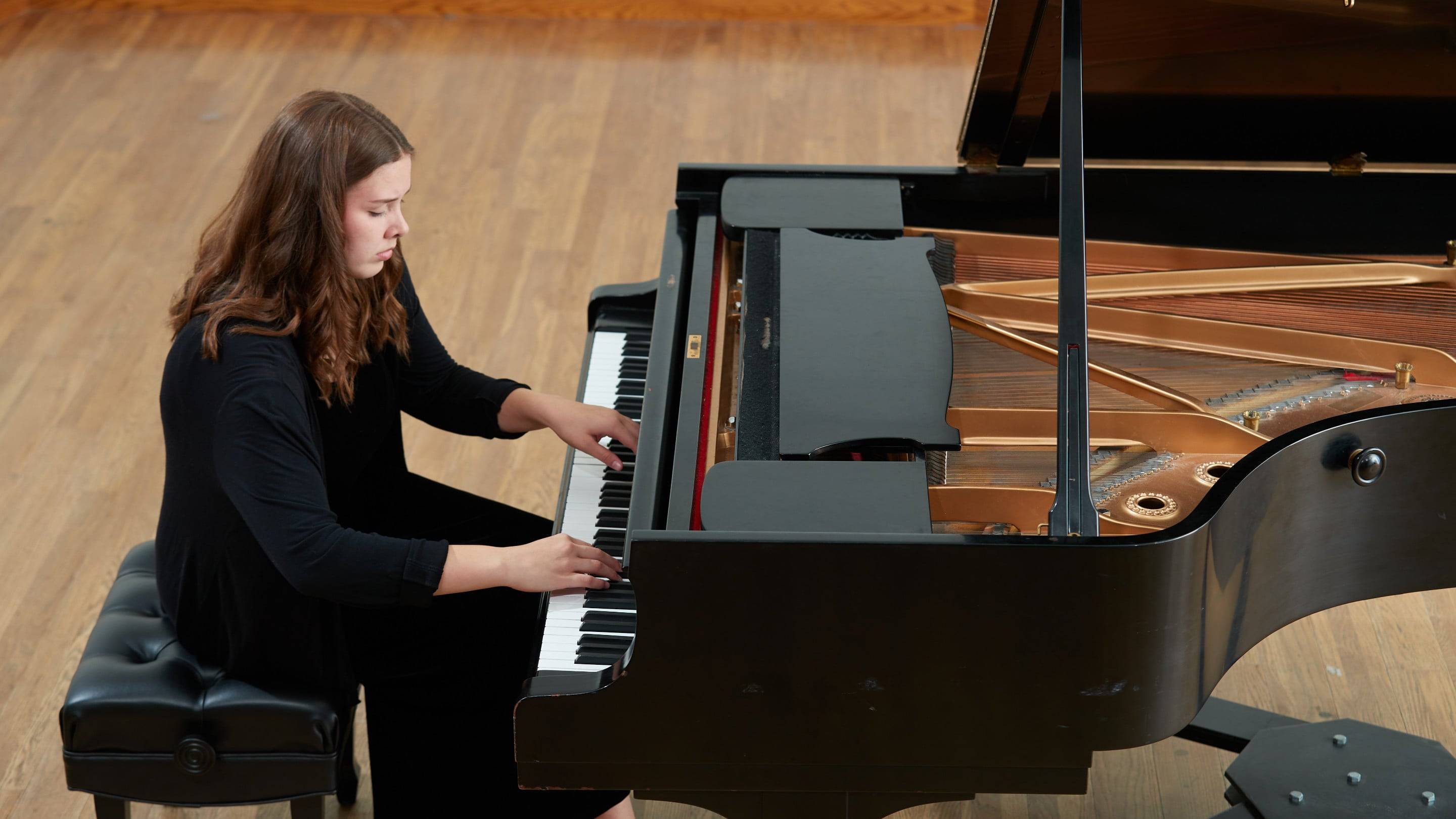 a person playing a piano
