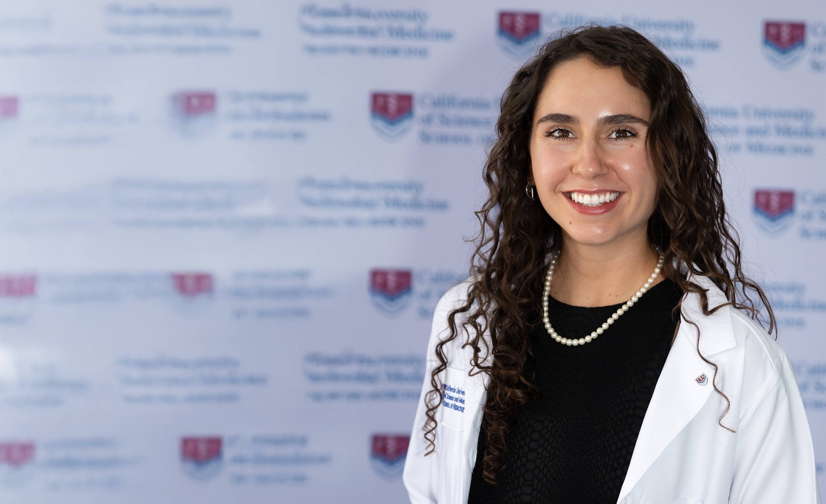 a person smiling for a picture