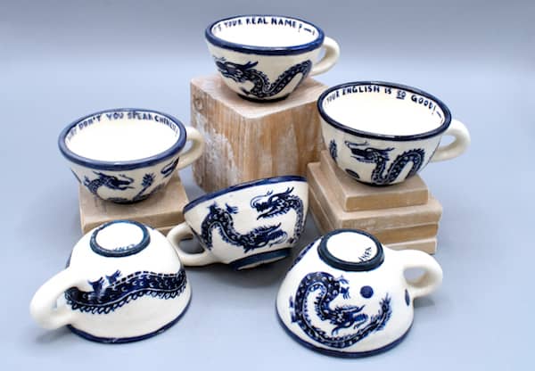 a group of tea cups and teacups
