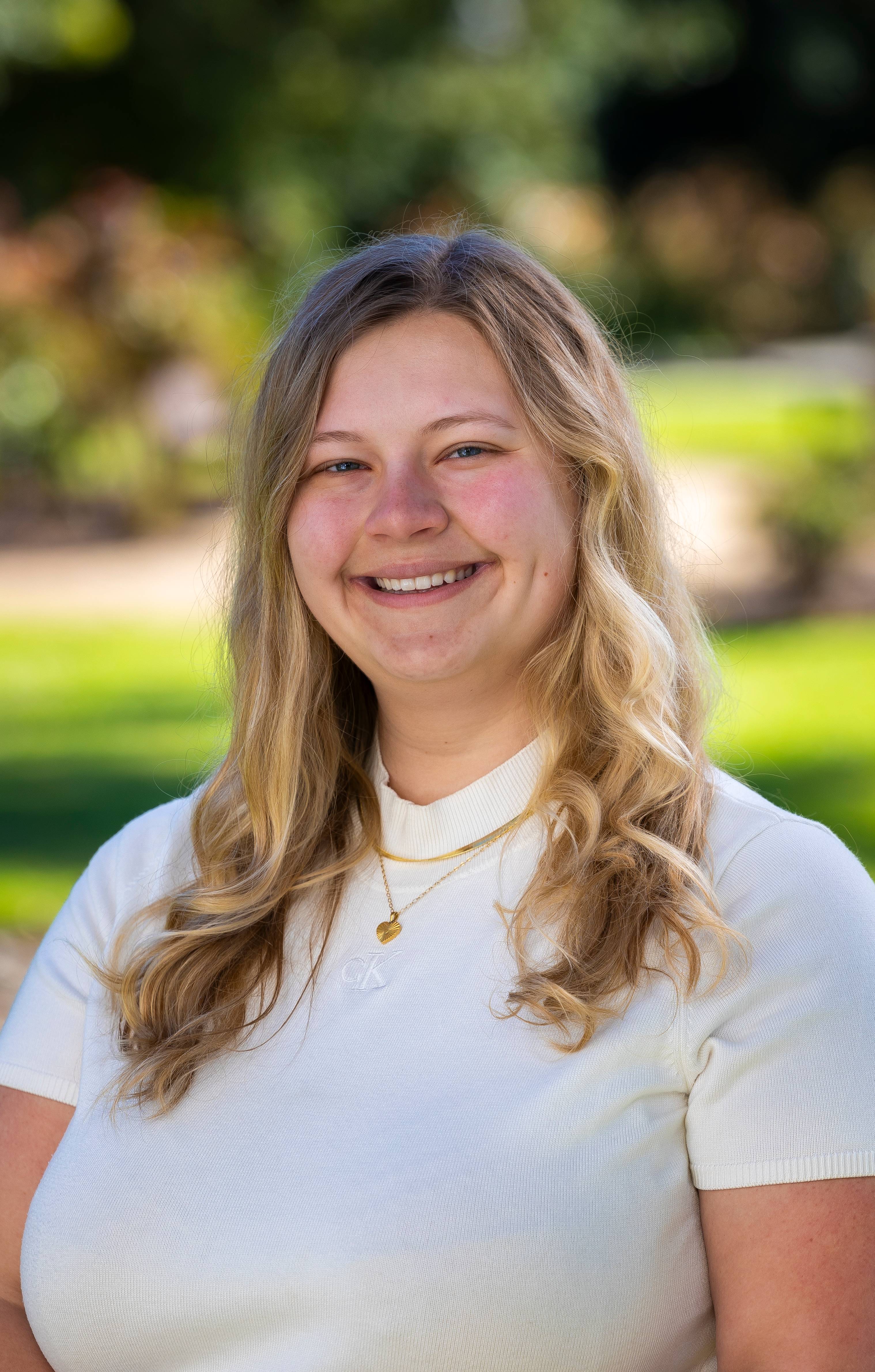 a person smiling for a picture