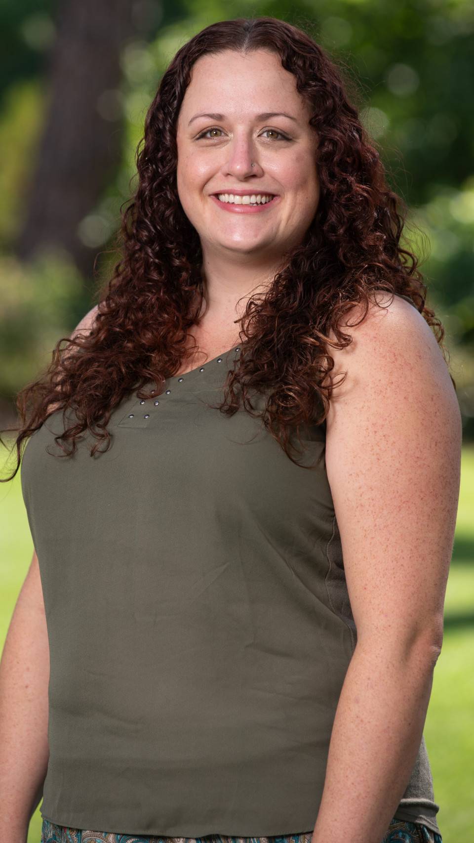 a person smiling at camera