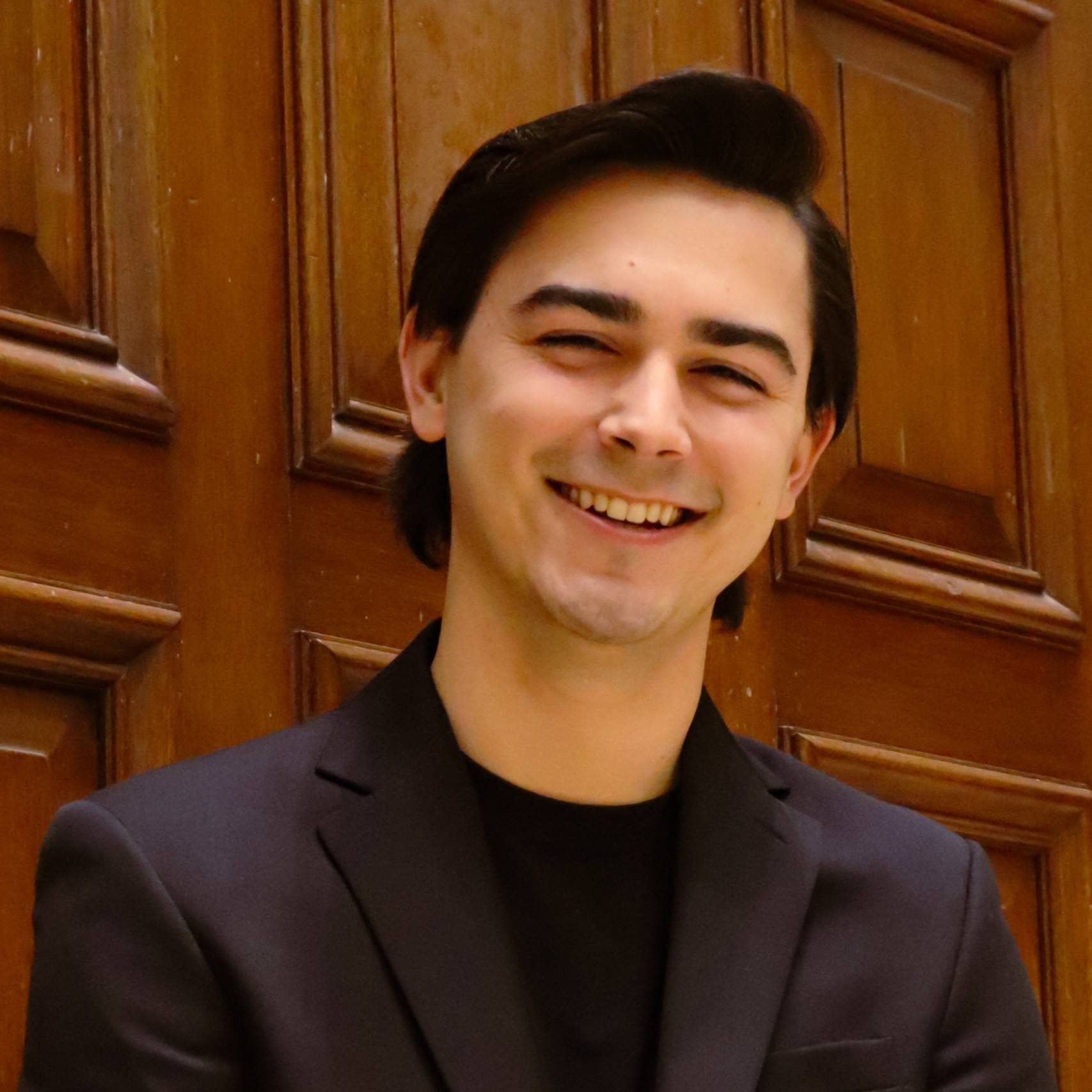 a person smiling at camera