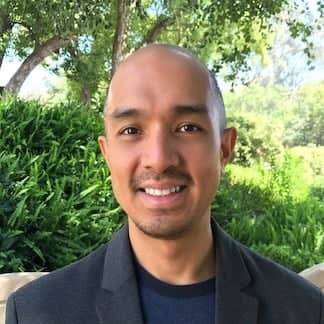 a person smiling for a picture