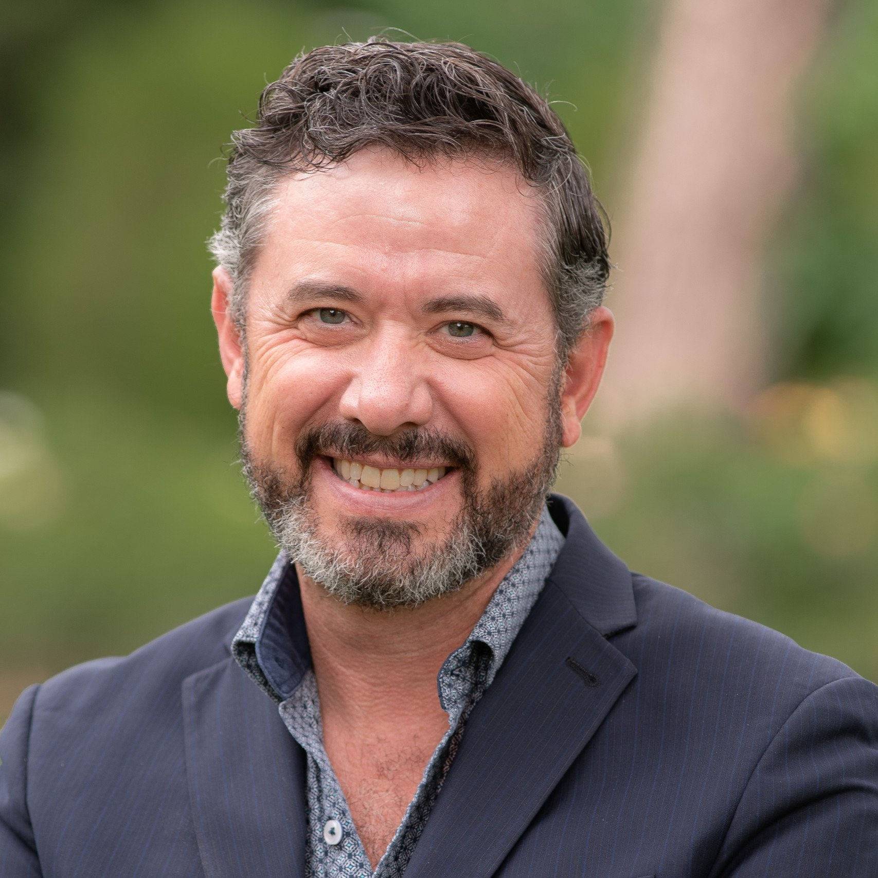 a person smiling for the camera