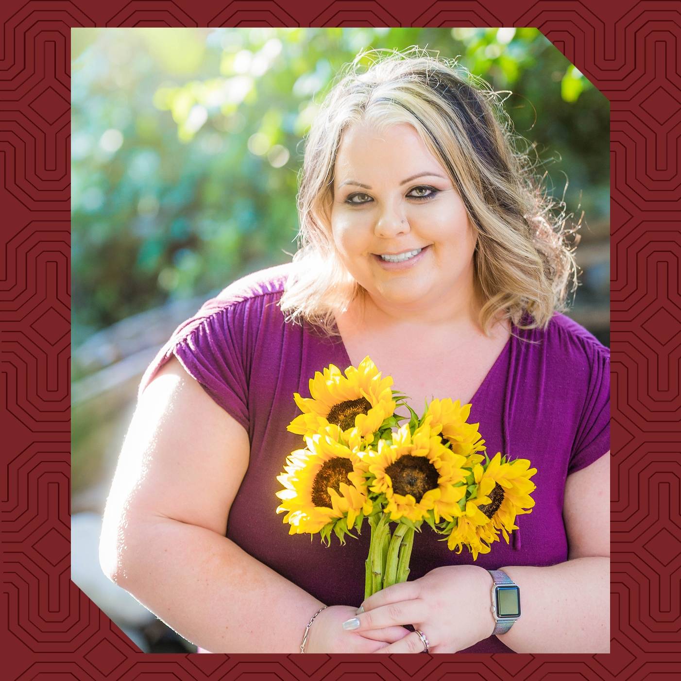 a person holding a bouquet of sunflowers