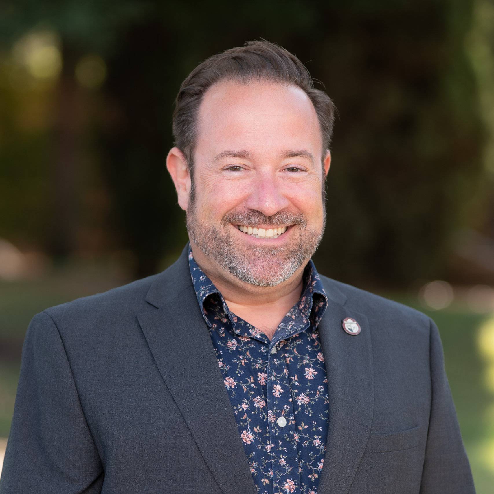 a person smiling for the camera