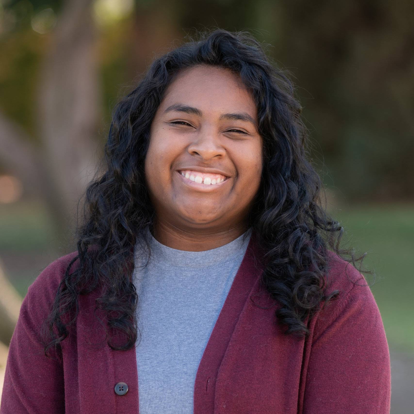 a person smiling at camera