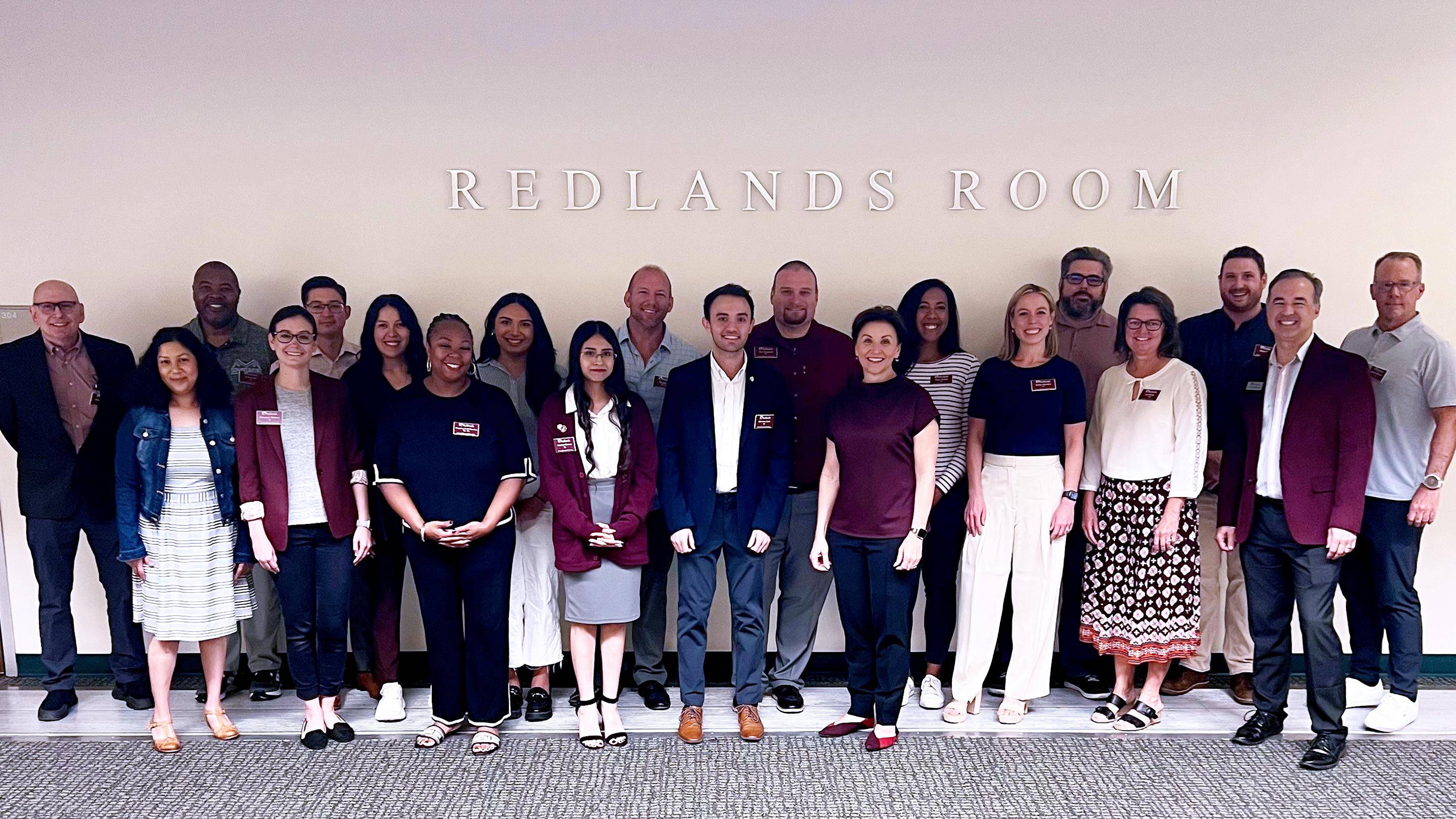 a group of people posing for a photo