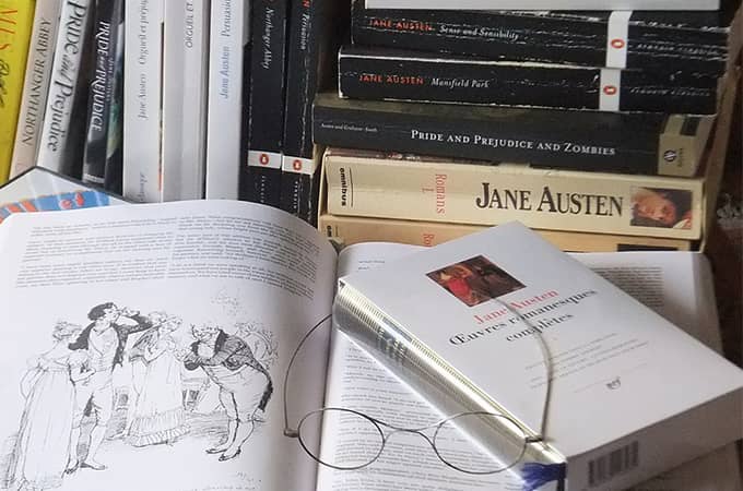 a book with glasses on top of it