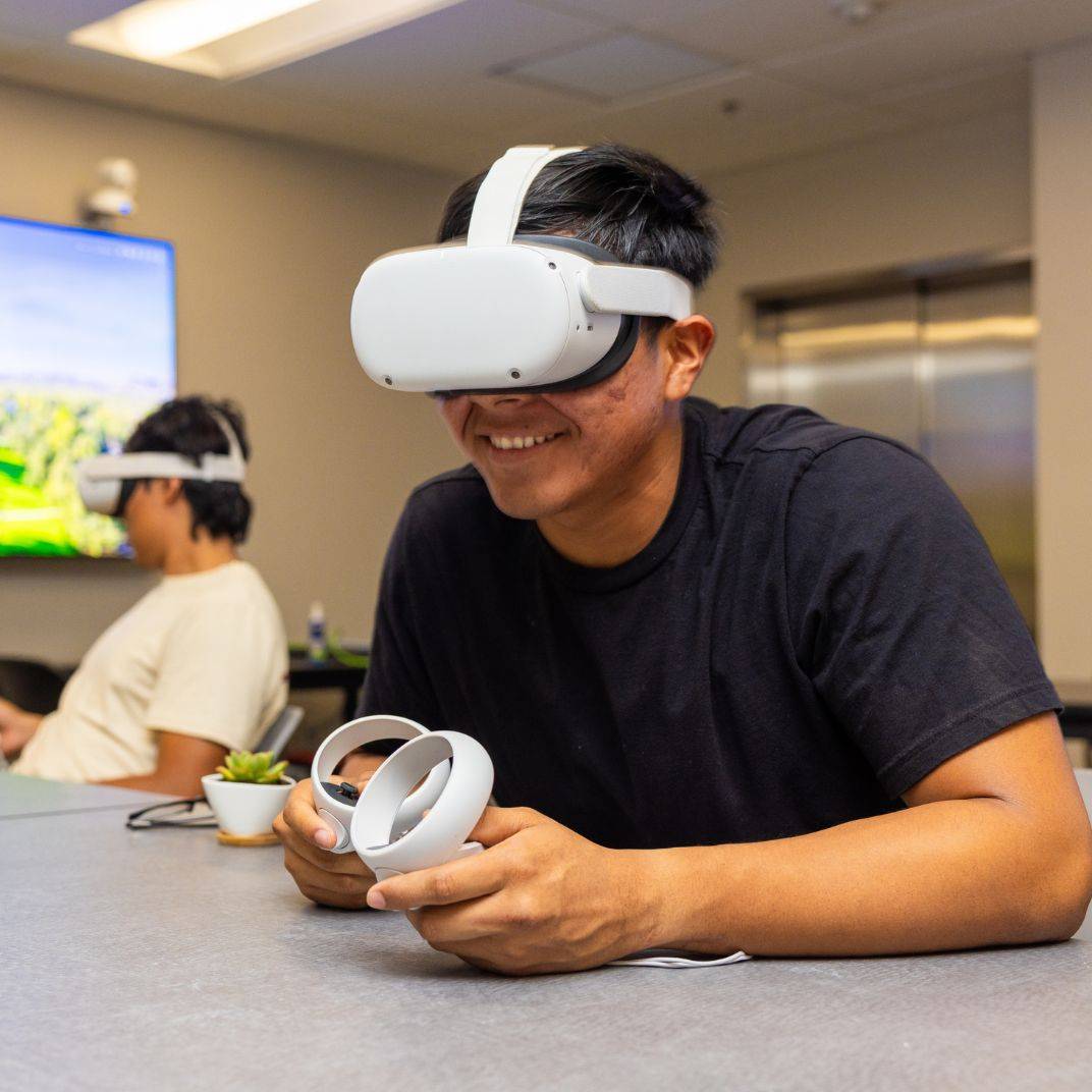 a person wearing virtual reality goggles