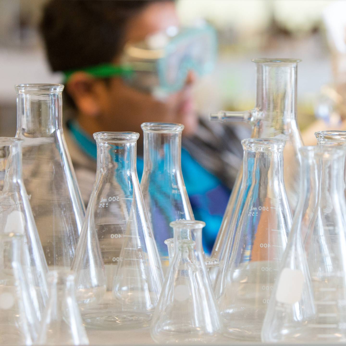 a group of glass beakers