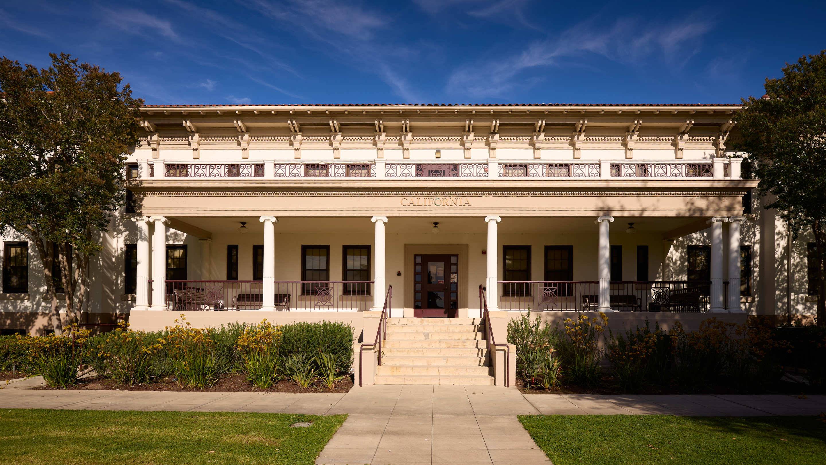 a building with columns and a walkway