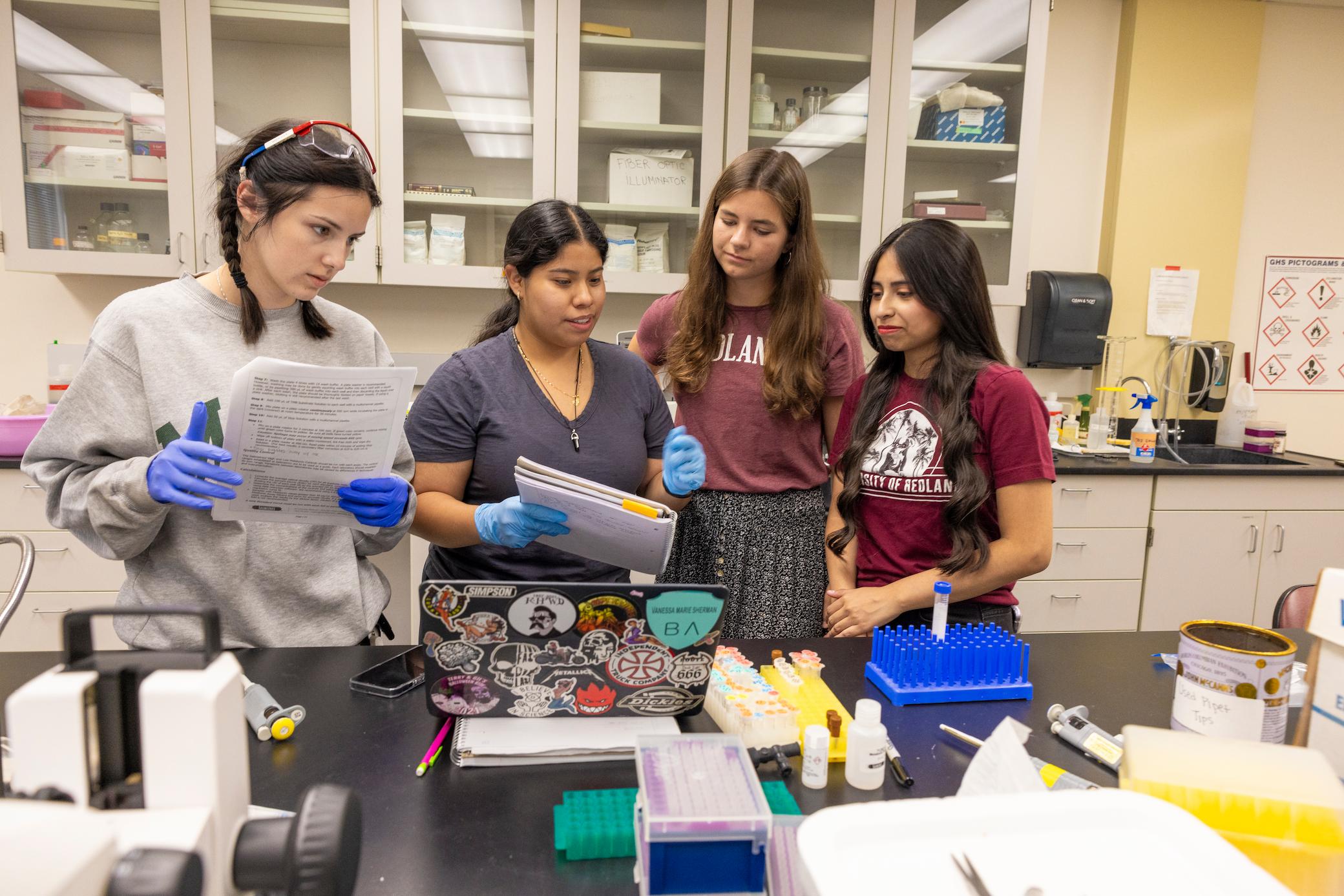 a group of women in a lab
