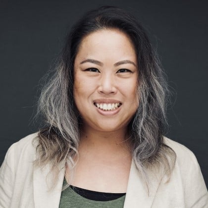 a woman smiling at the camera