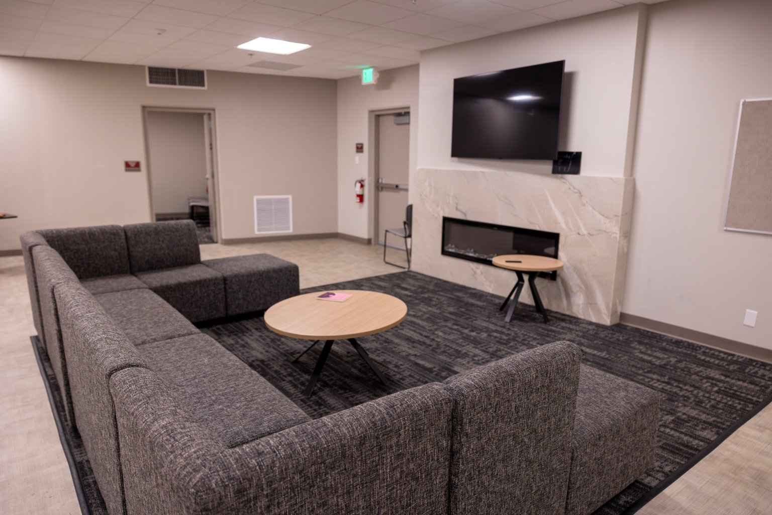 a room with a couch and a tv