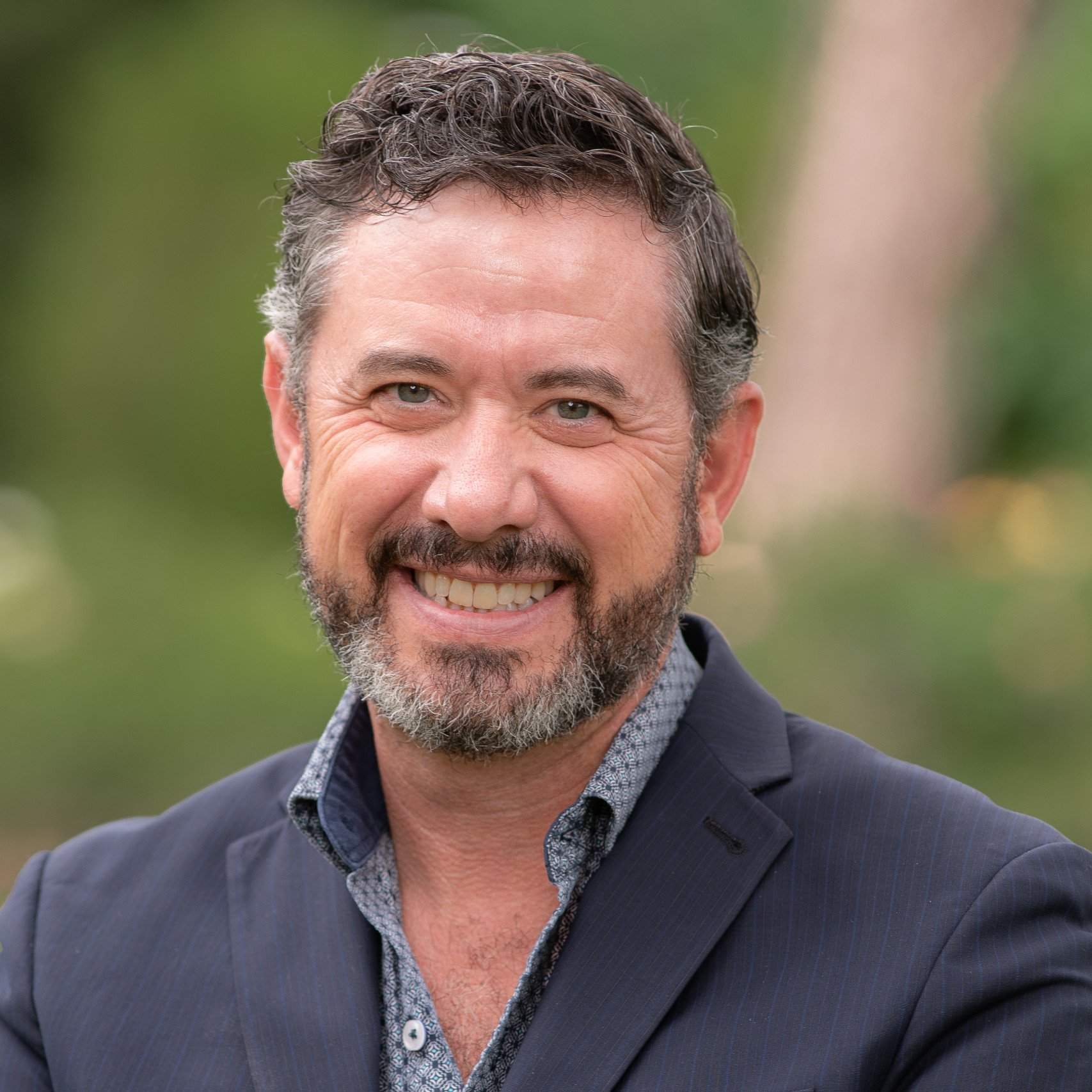 a person smiling for a picture