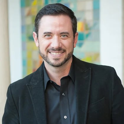 a person in a black suit