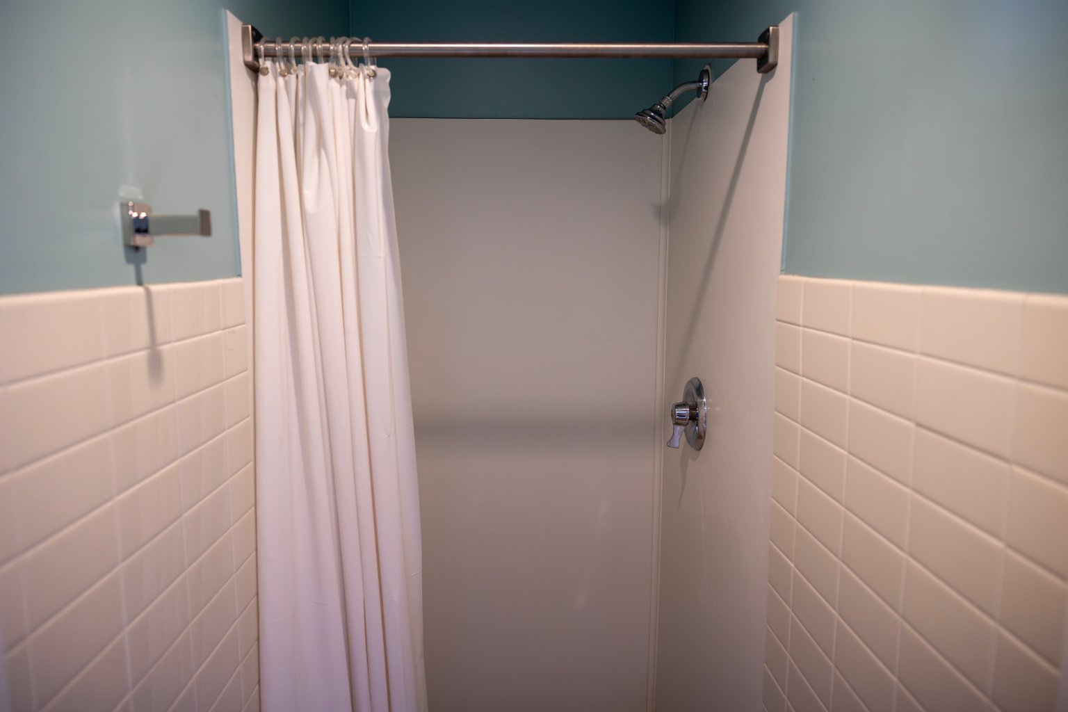 a shower curtain in a bathroom