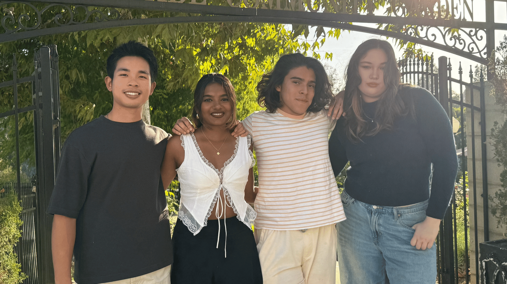 a group of people posing for a photo