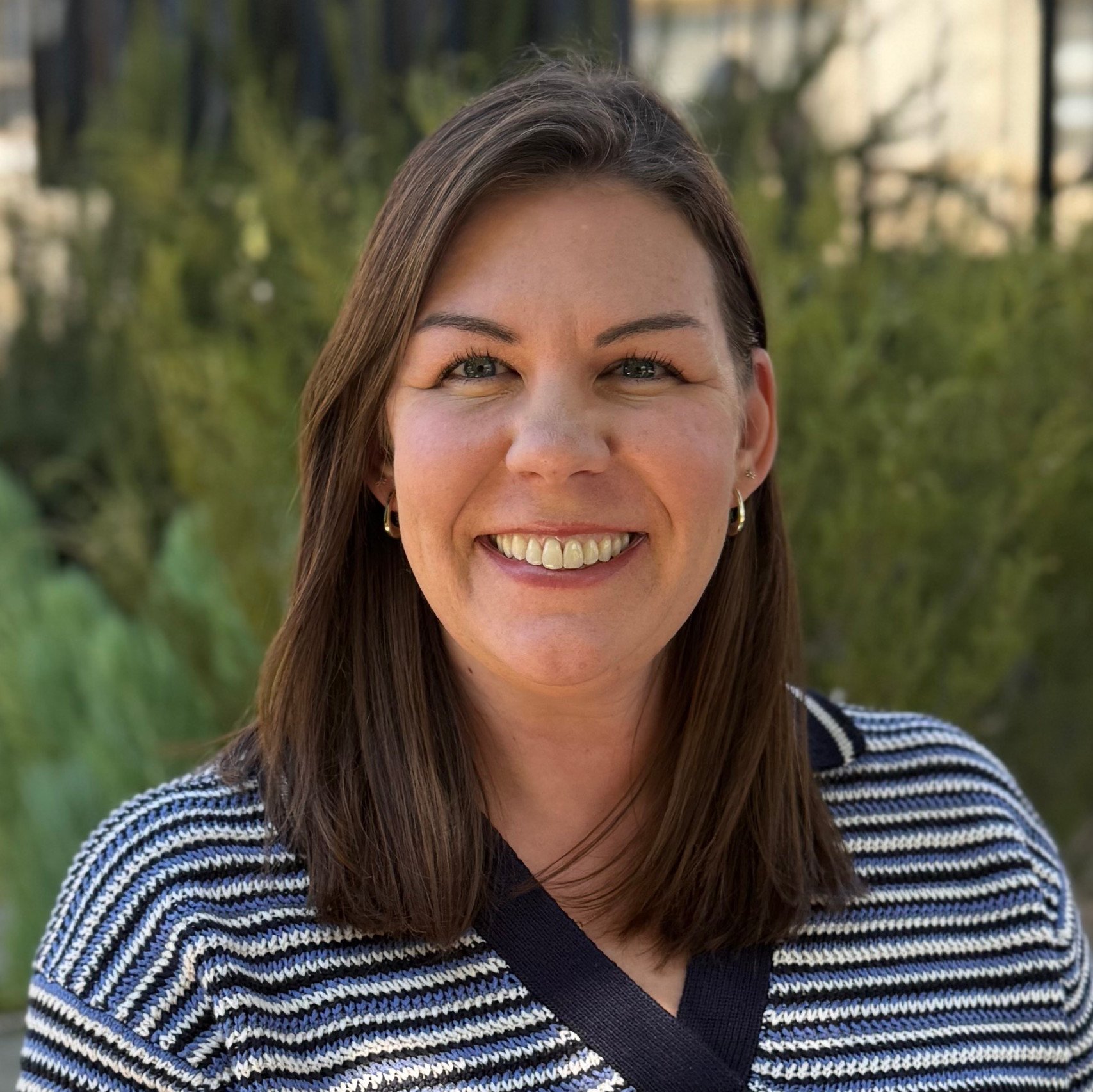 a person smiling for a picture