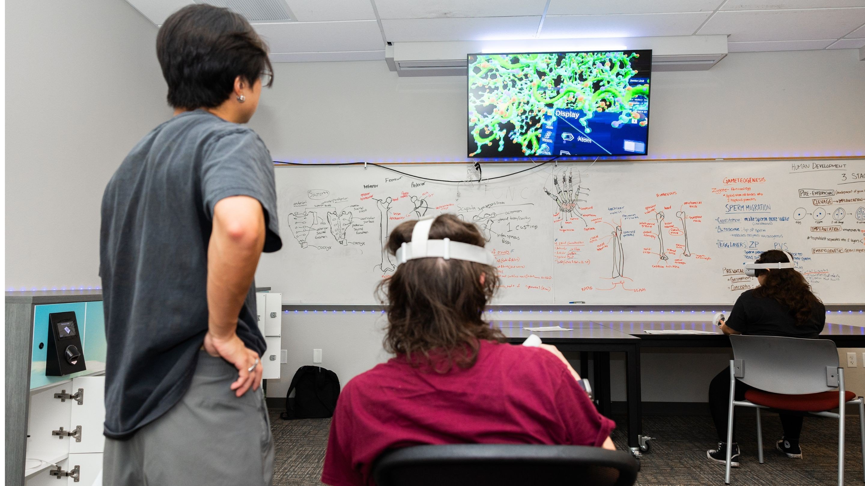 a person and person in a classroom