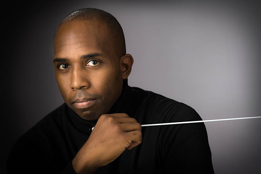 a person holding a stick