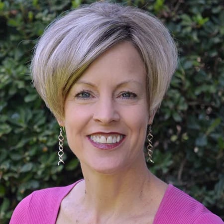 a person smiling for a picture