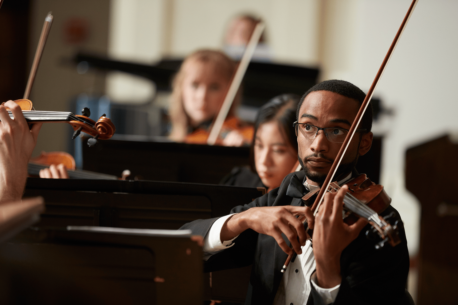a man playing a violin