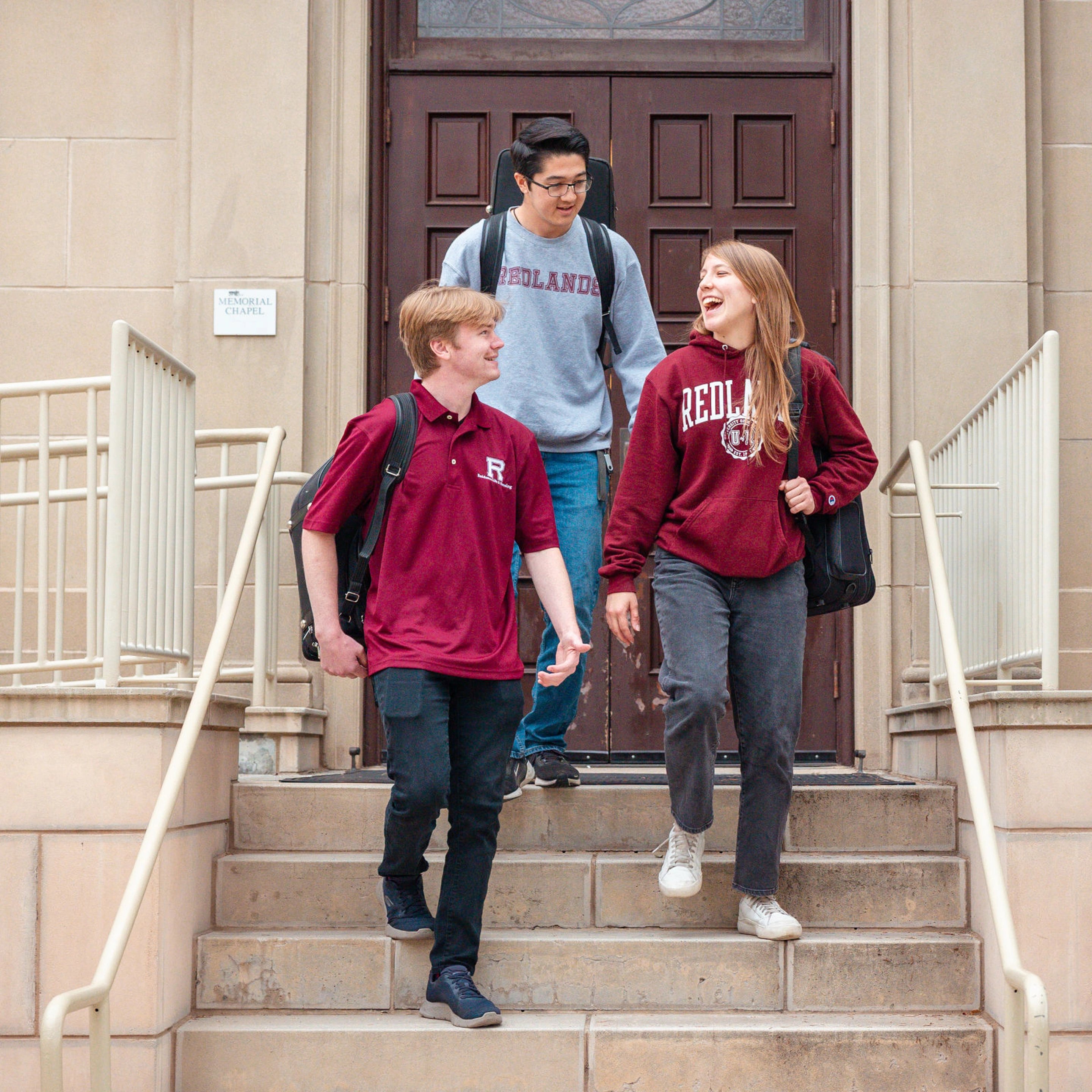 a group of people walking up stairs