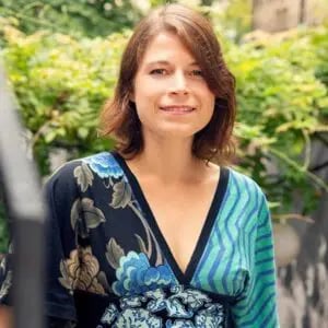 a woman smiling at the camera