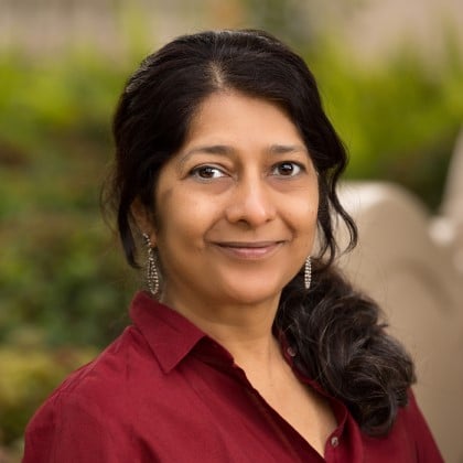 a person smiling at the camera