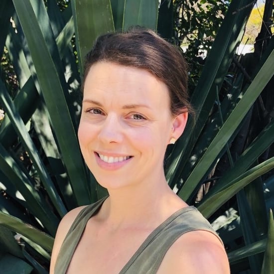 a woman smiling at camera