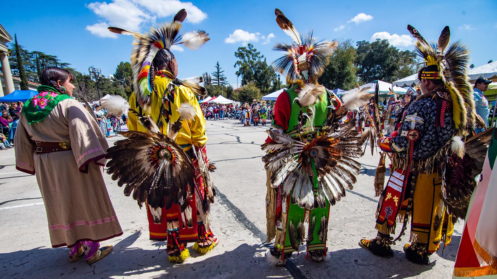 a group of people wearing traditional clothing