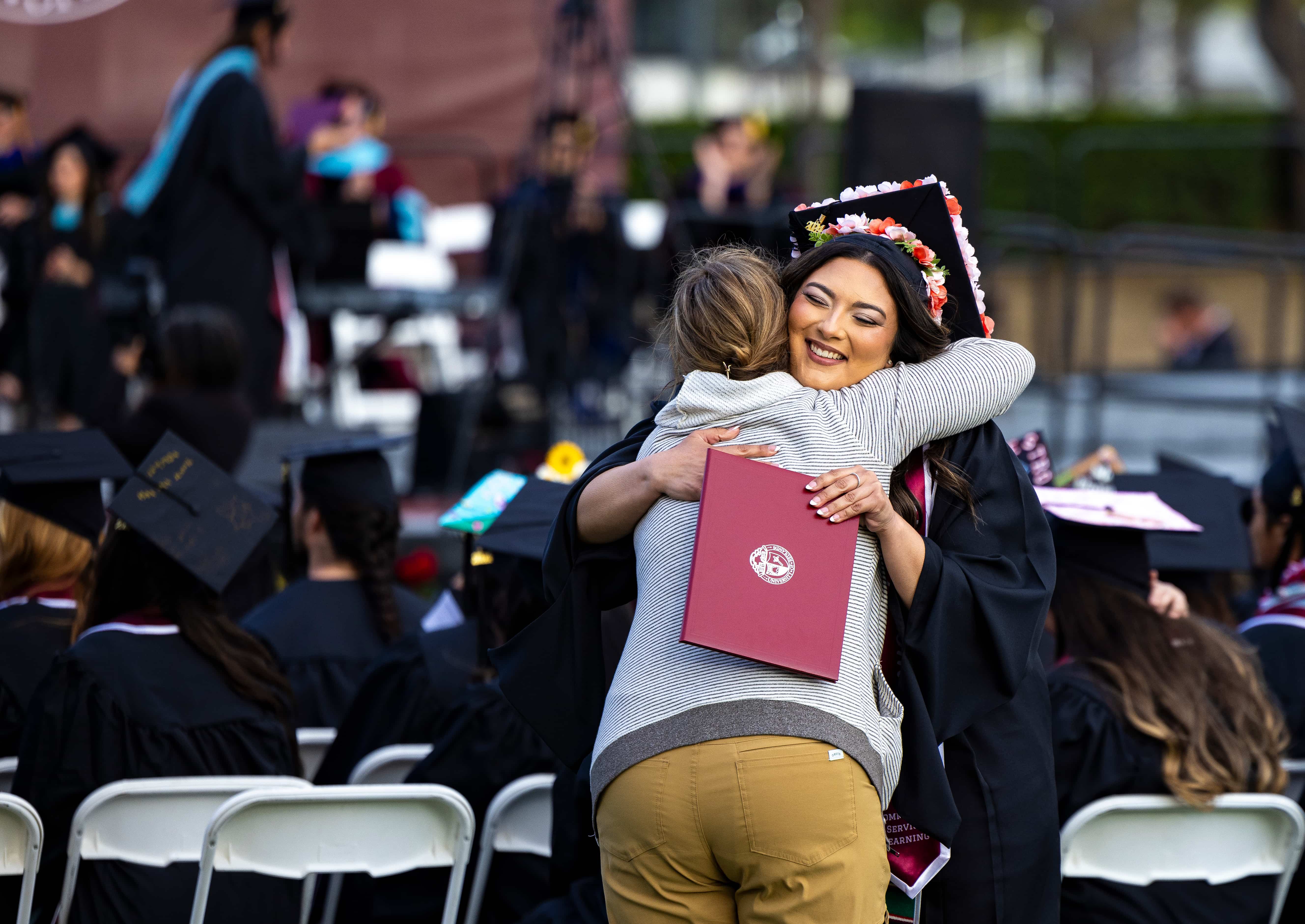 a woman hugging a child
