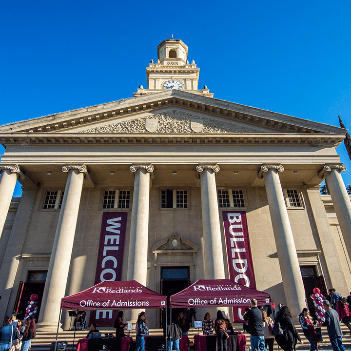 a group of people outside of a building