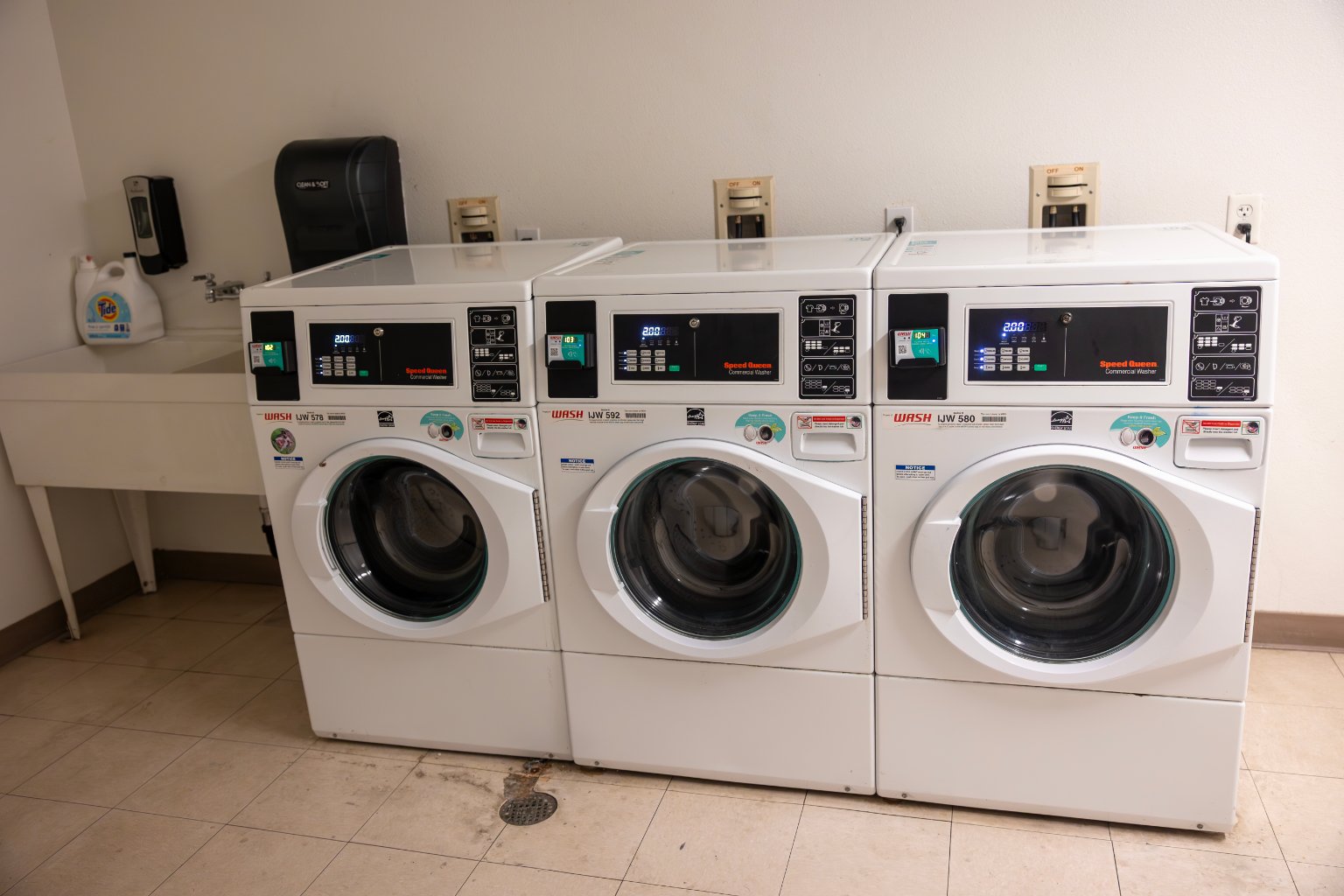 a group of white washing machines