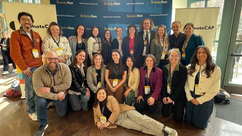 a group of people posing for a photo