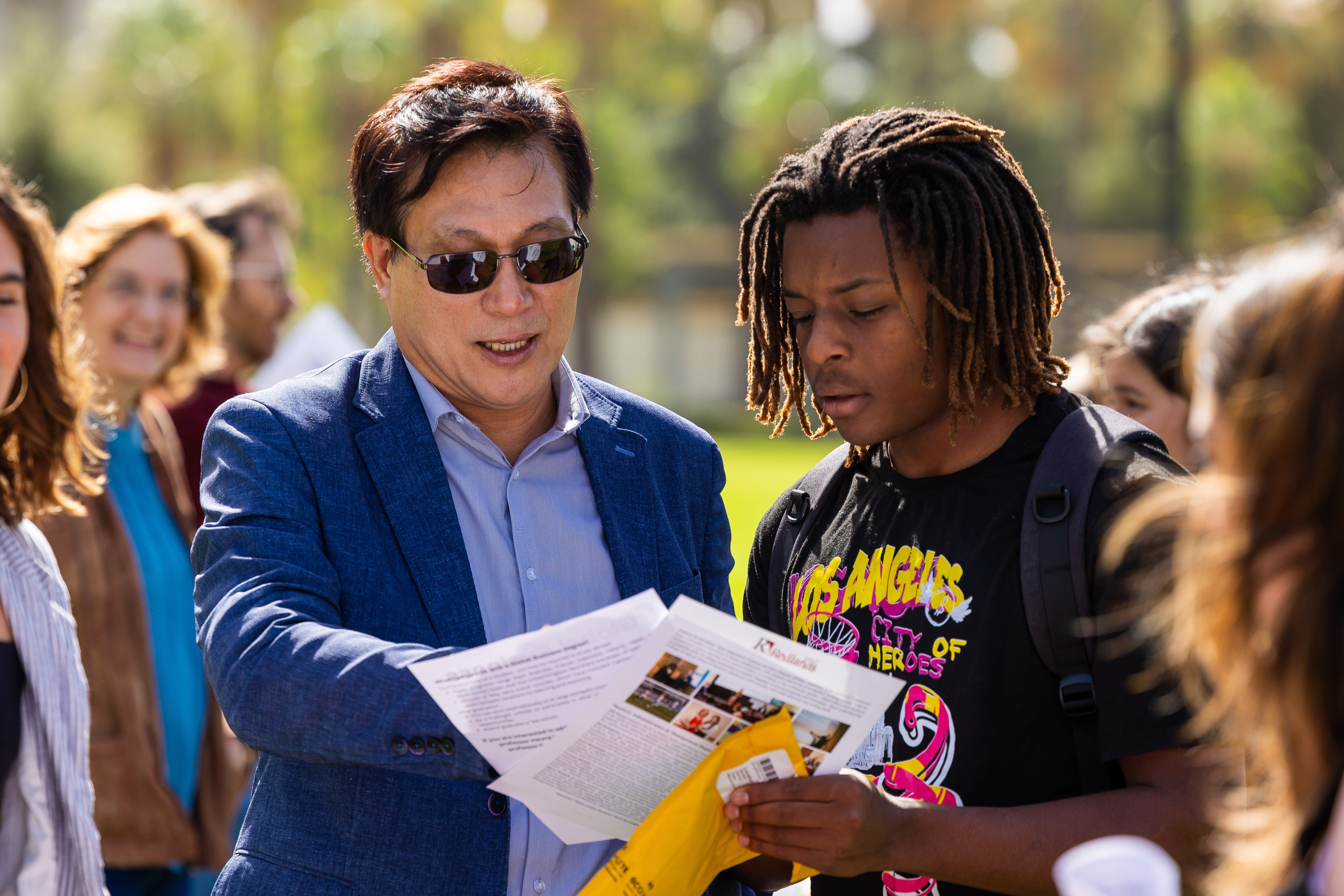 a person looking at a paper